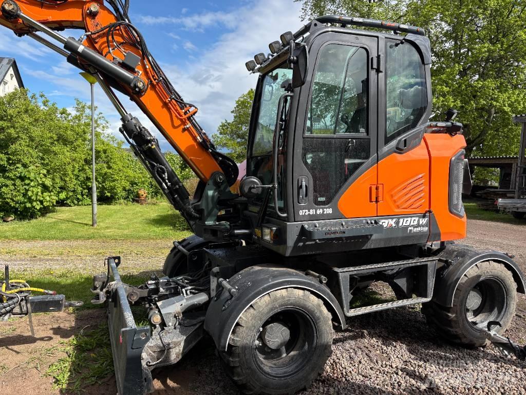 Develon DX 100 W-7 Pyöräkaivukoneet