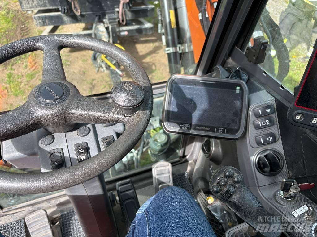 Develon DX 100 W-7 Pyöräkaivukoneet