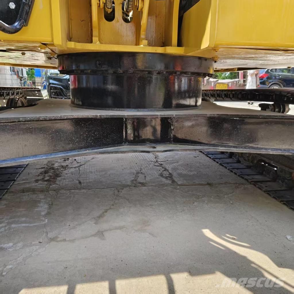 CAT 310 Telakaivukoneet
