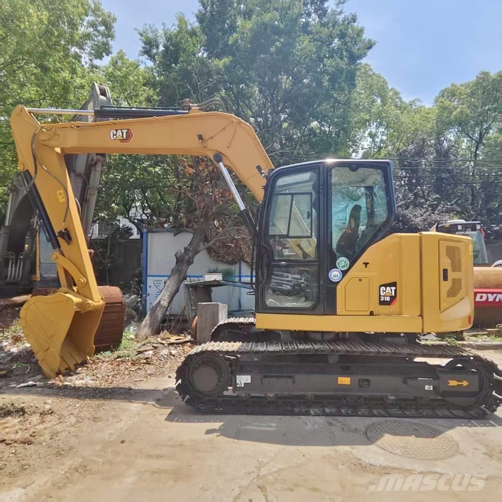 CAT 310 Telakaivukoneet