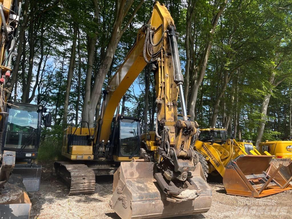 CAT 323 Telakaivukoneet