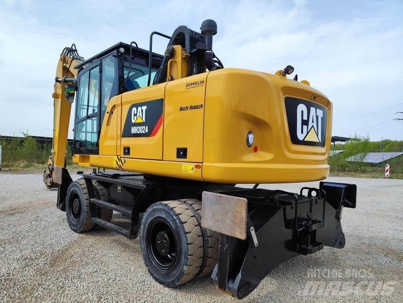 CAT MH3024 Jätteenkäsittelijät