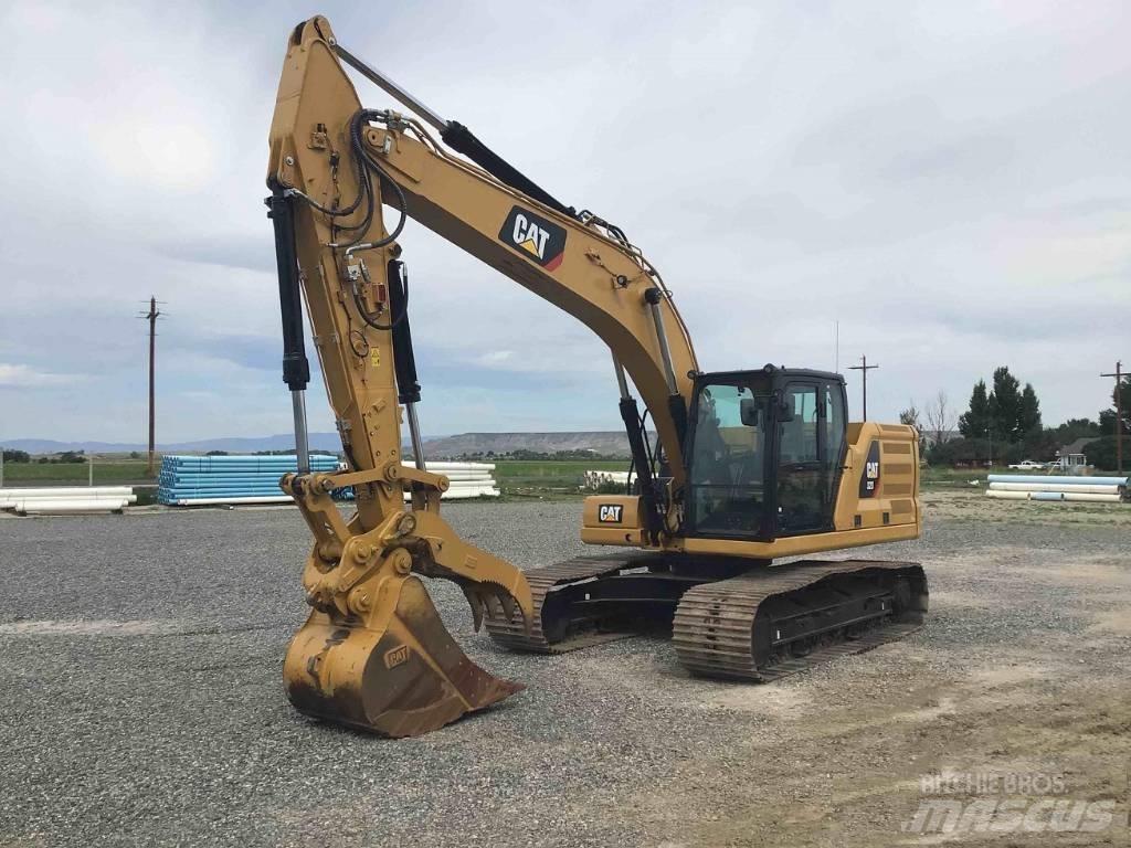 CAT 323 Telakaivukoneet