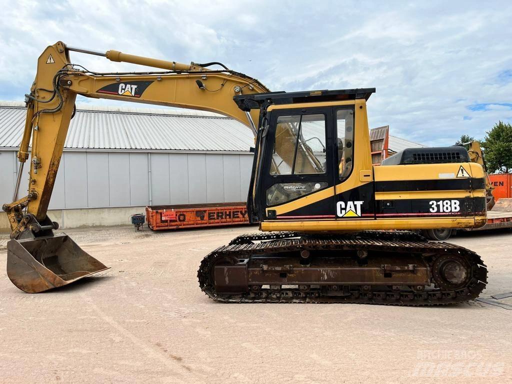CAT 318BL Telakaivukoneet