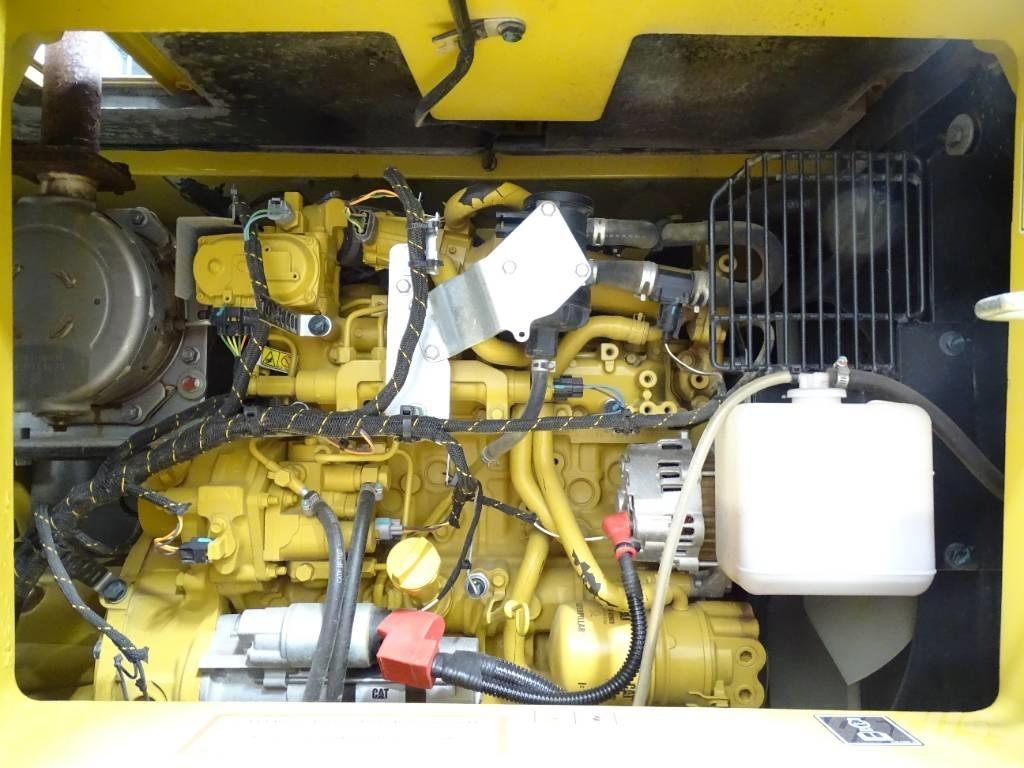 CAT 310 Telakaivukoneet