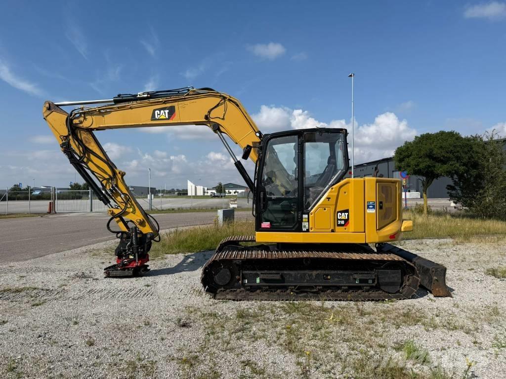CAT 310 Telakaivukoneet