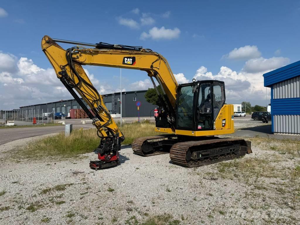 CAT 310 Telakaivukoneet