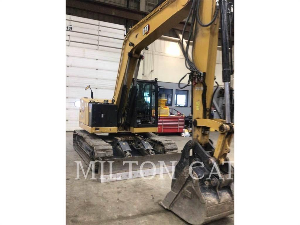 CAT 310 Telakaivukoneet