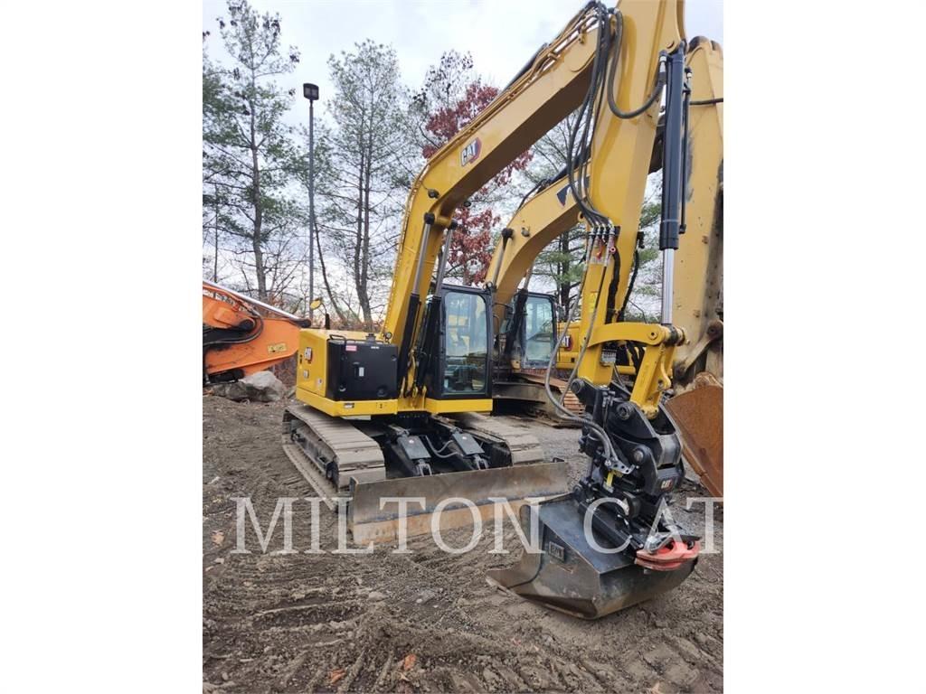 CAT 310 Telakaivukoneet