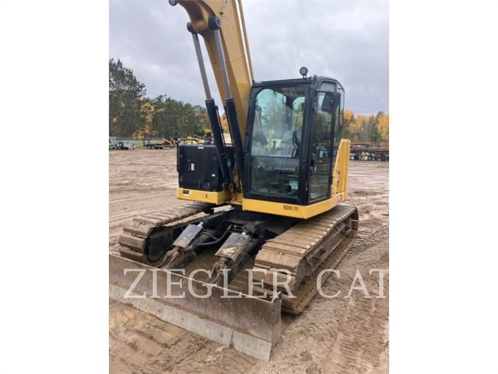 CAT 310 Telakaivukoneet