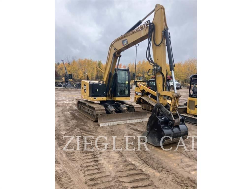 CAT 310 Telakaivukoneet