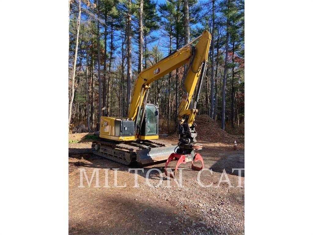 CAT 310 Telakaivukoneet