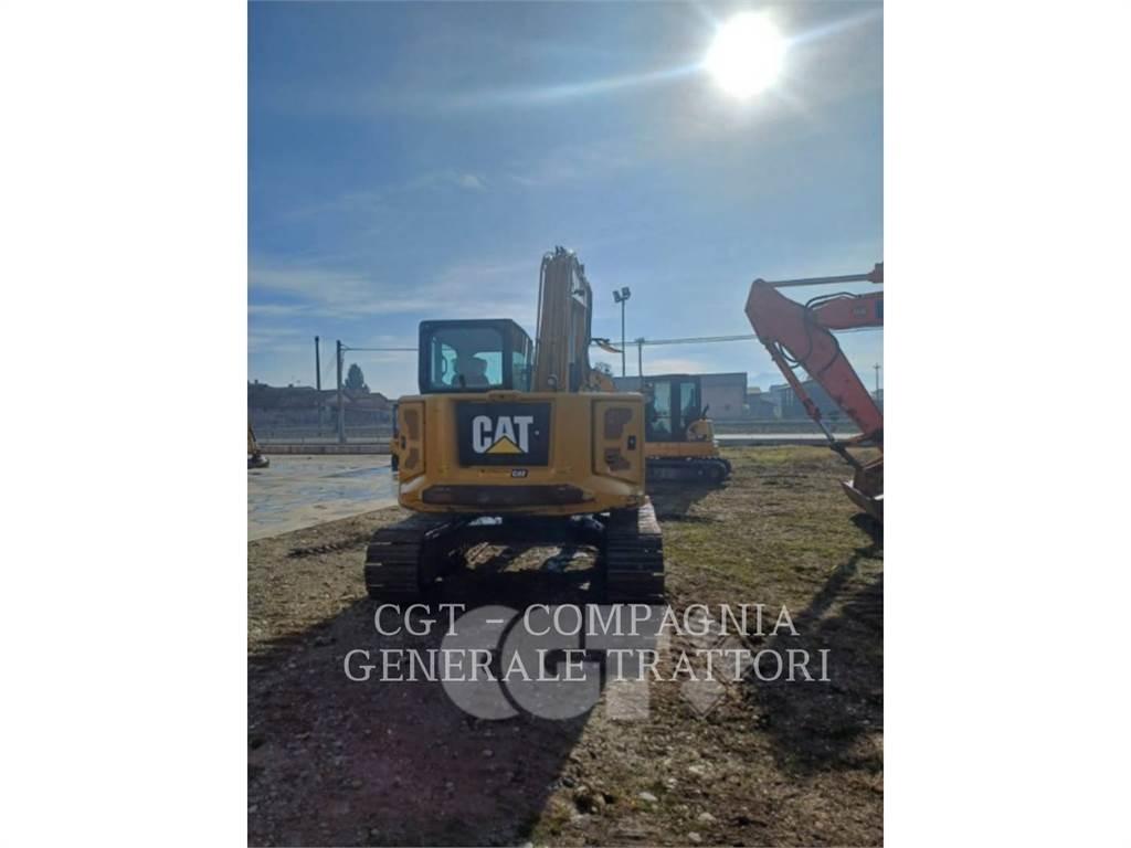 CAT 310 Telakaivukoneet