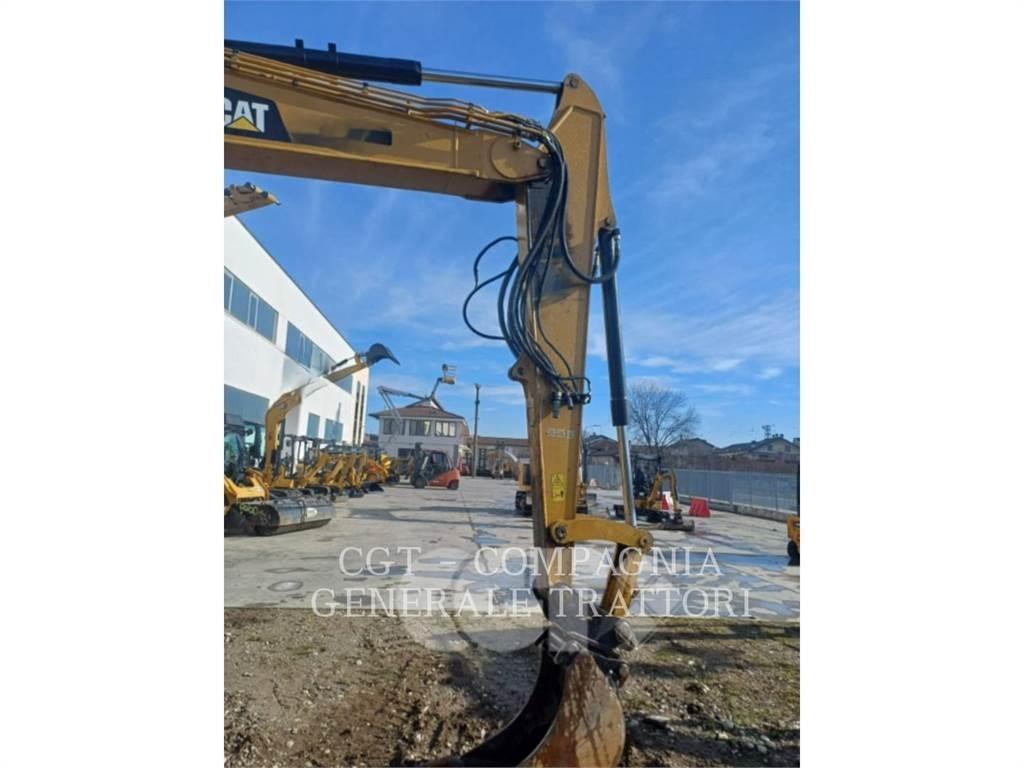CAT 310 Telakaivukoneet