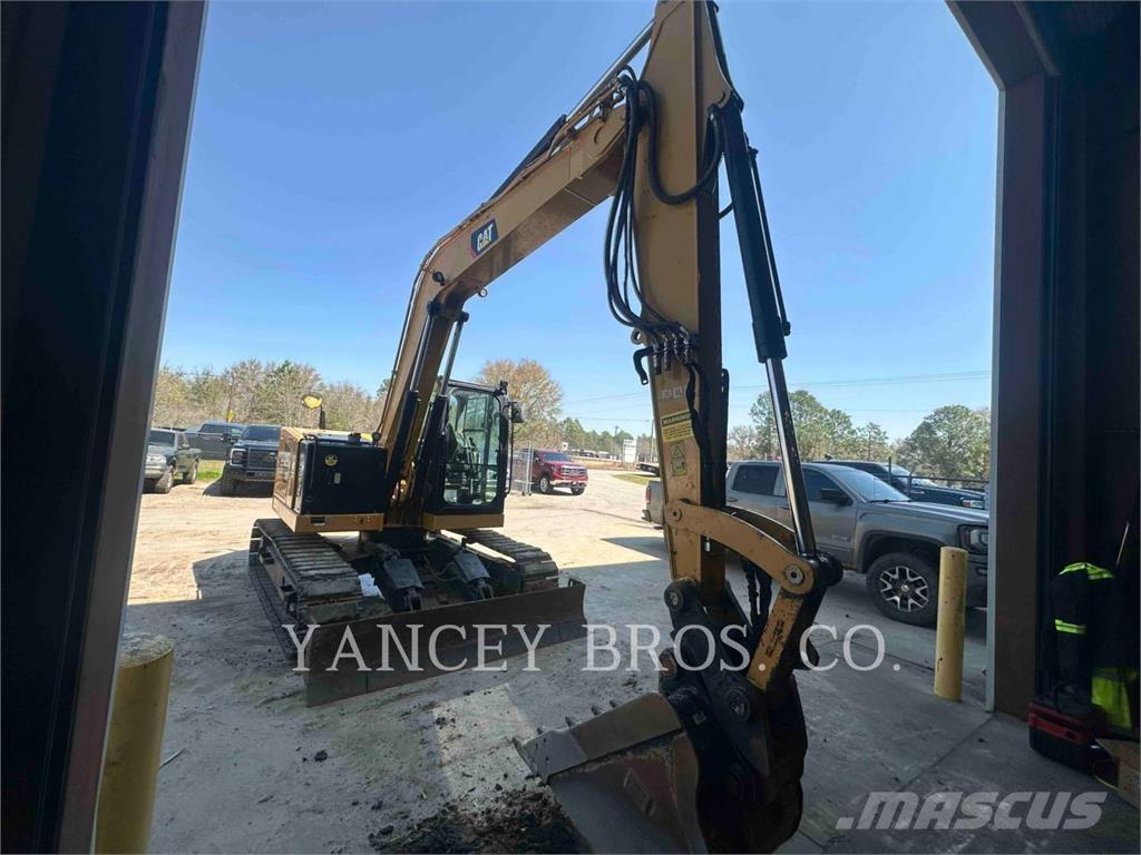 CAT 310 Telakaivukoneet