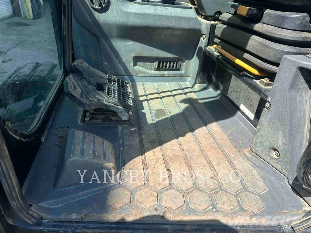 CAT 310 Telakaivukoneet