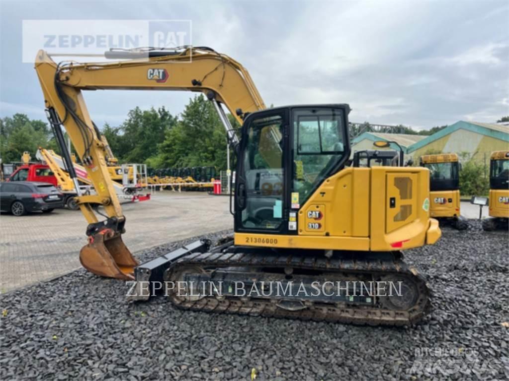CAT 310 Telakaivukoneet