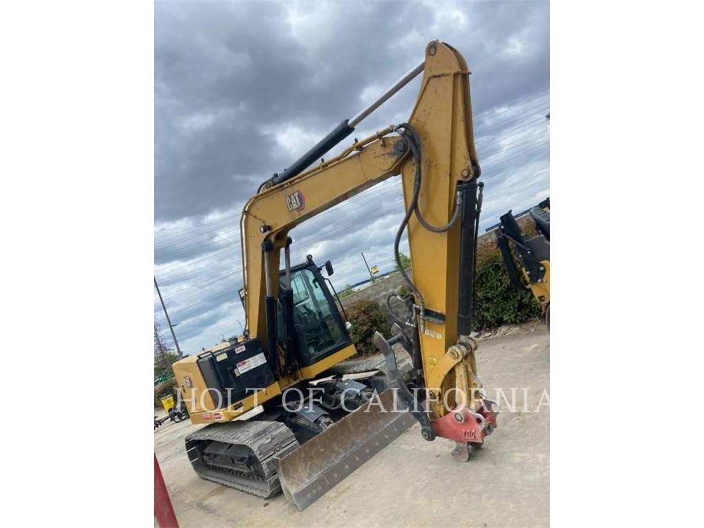 CAT 310 Telakaivukoneet