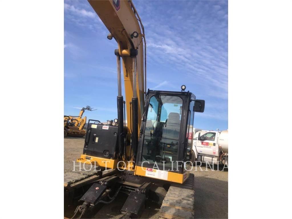 CAT 310 Telakaivukoneet