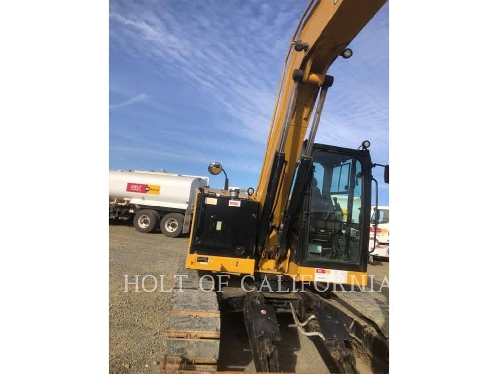 CAT 310 Telakaivukoneet