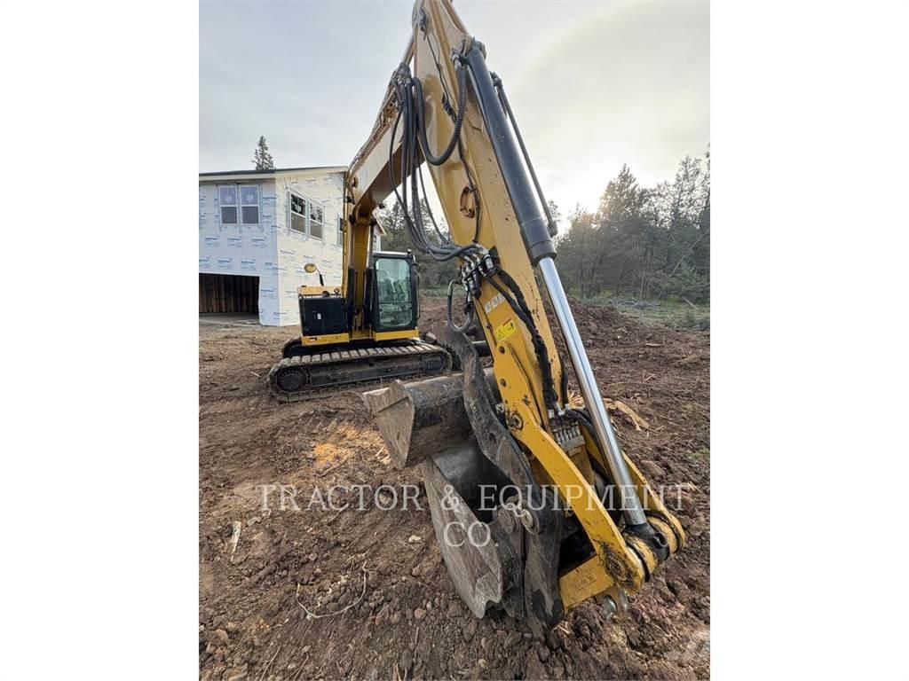 CAT 310 Telakaivukoneet