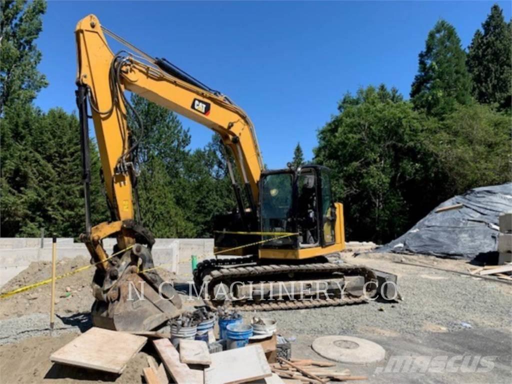 CAT 310 Telakaivukoneet