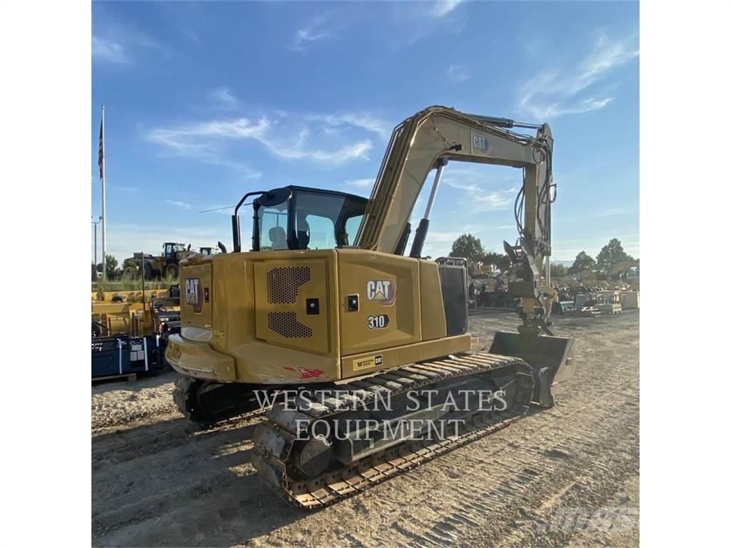 CAT 310 Telakaivukoneet