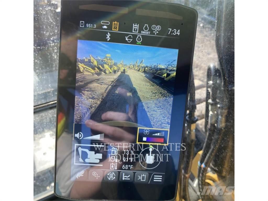 CAT 310 Telakaivukoneet