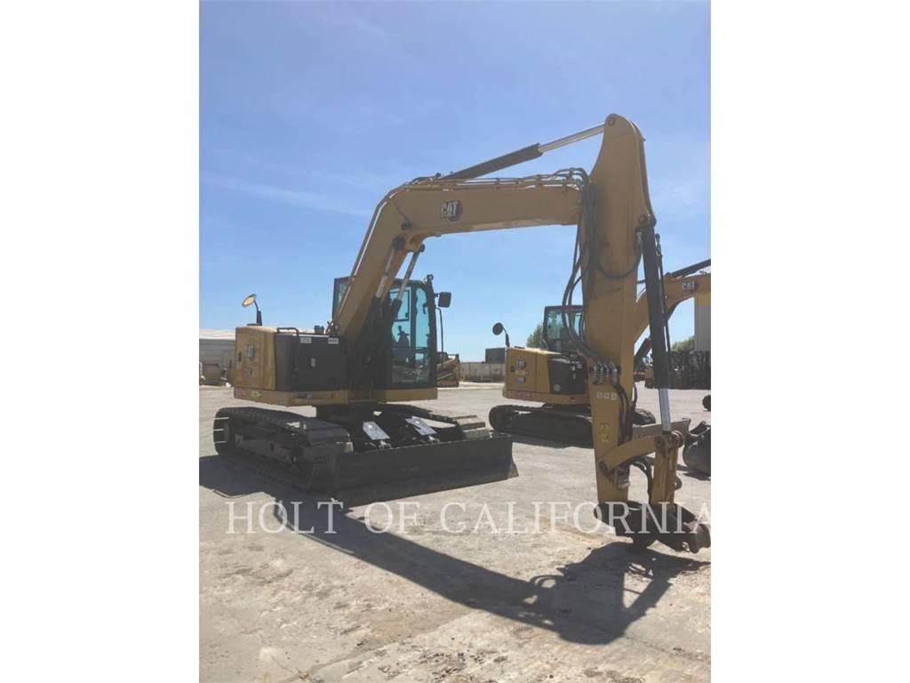 CAT 310 Telakaivukoneet
