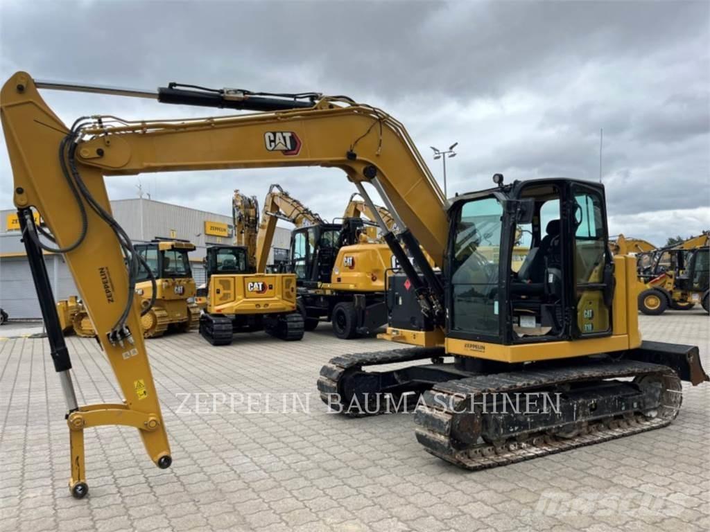 CAT 310 Telakaivukoneet