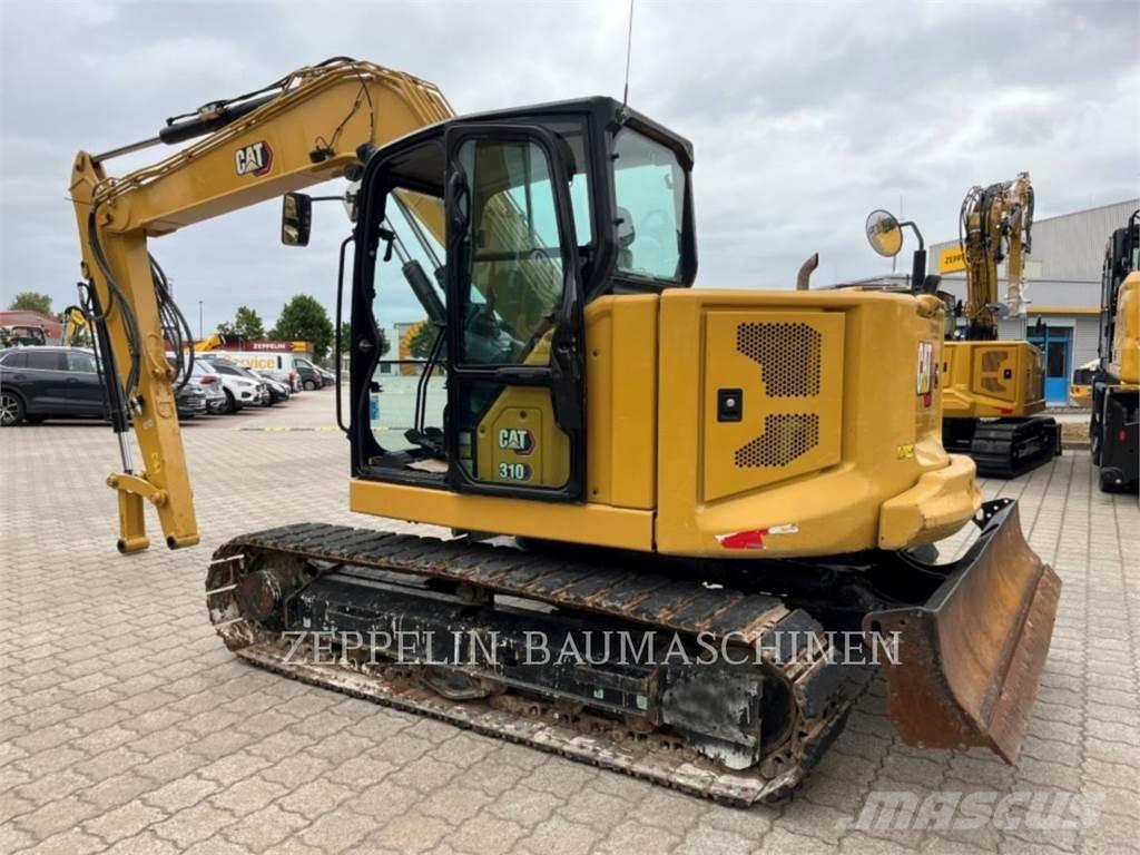 CAT 310 Telakaivukoneet
