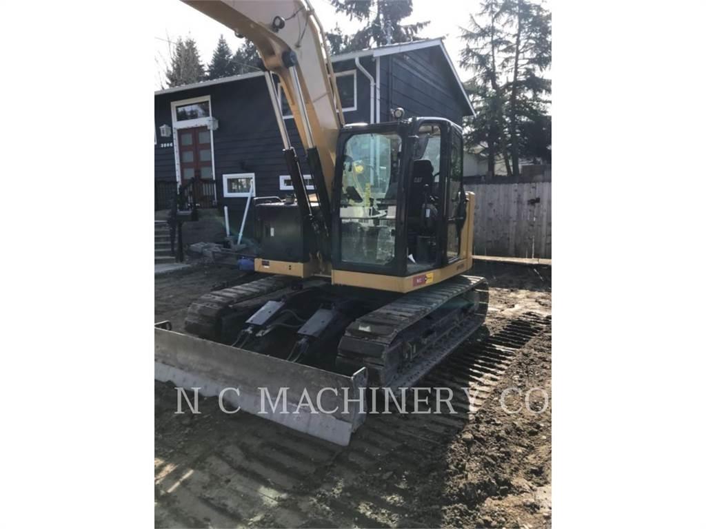 CAT 310 Telakaivukoneet