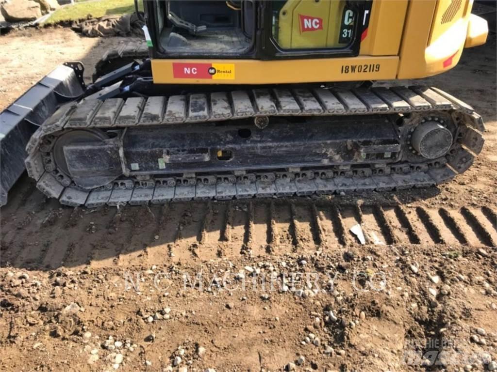 CAT 310 Telakaivukoneet