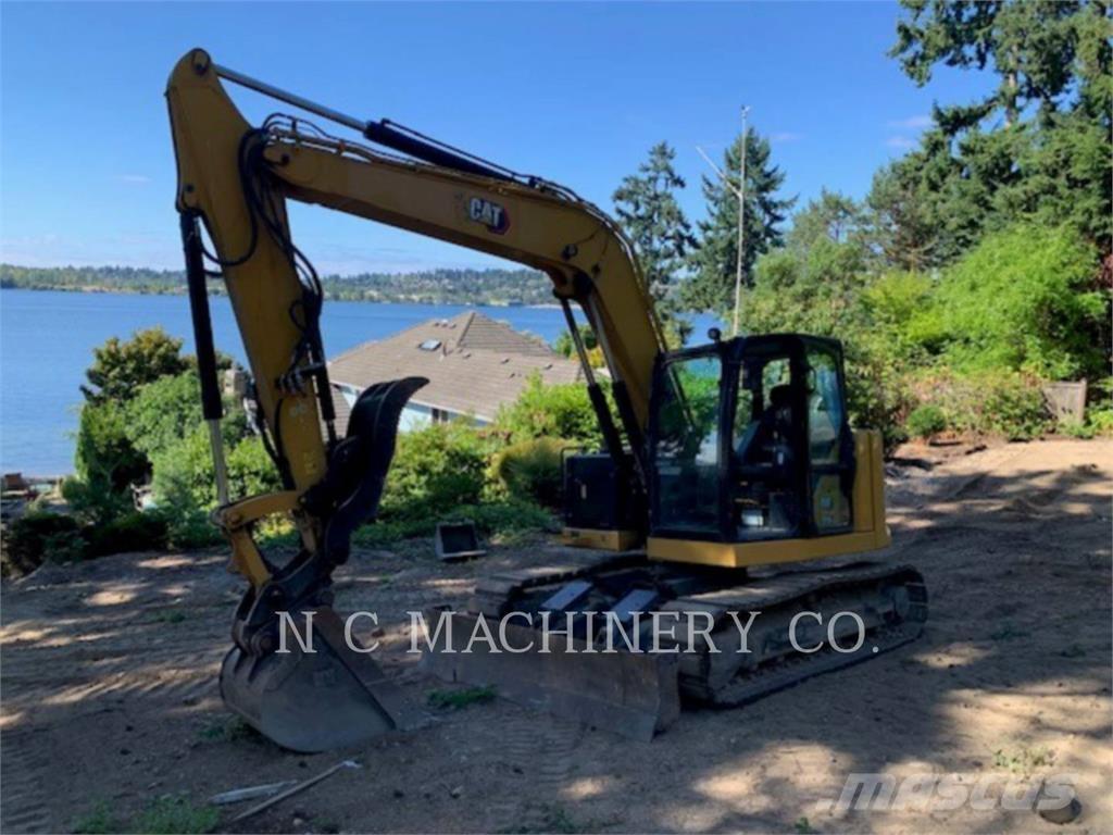 CAT 310 Telakaivukoneet