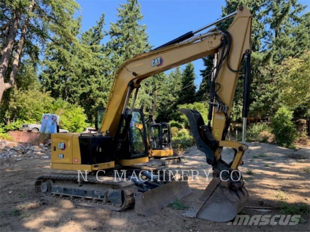 CAT 310 Telakaivukoneet