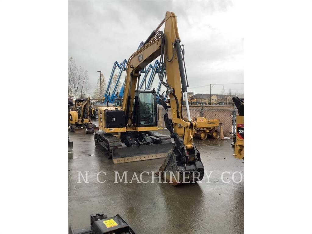 CAT 310 Telakaivukoneet