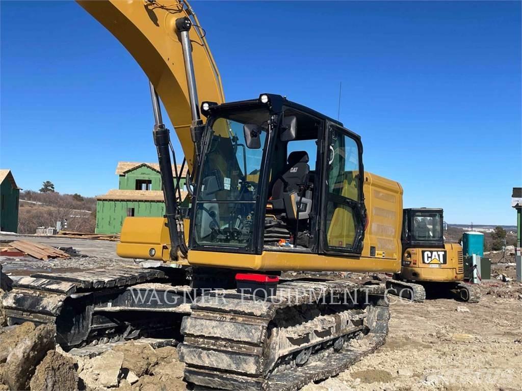 CAT 323 Telakaivukoneet