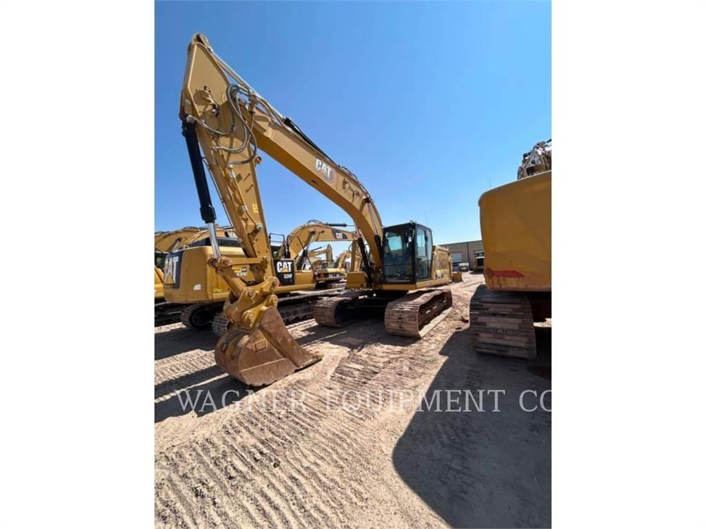 CAT 323 Telakaivukoneet