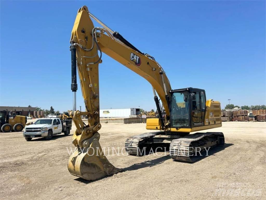 CAT 323 Telakaivukoneet