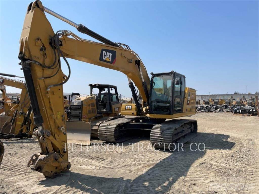 CAT 323 Telakaivukoneet