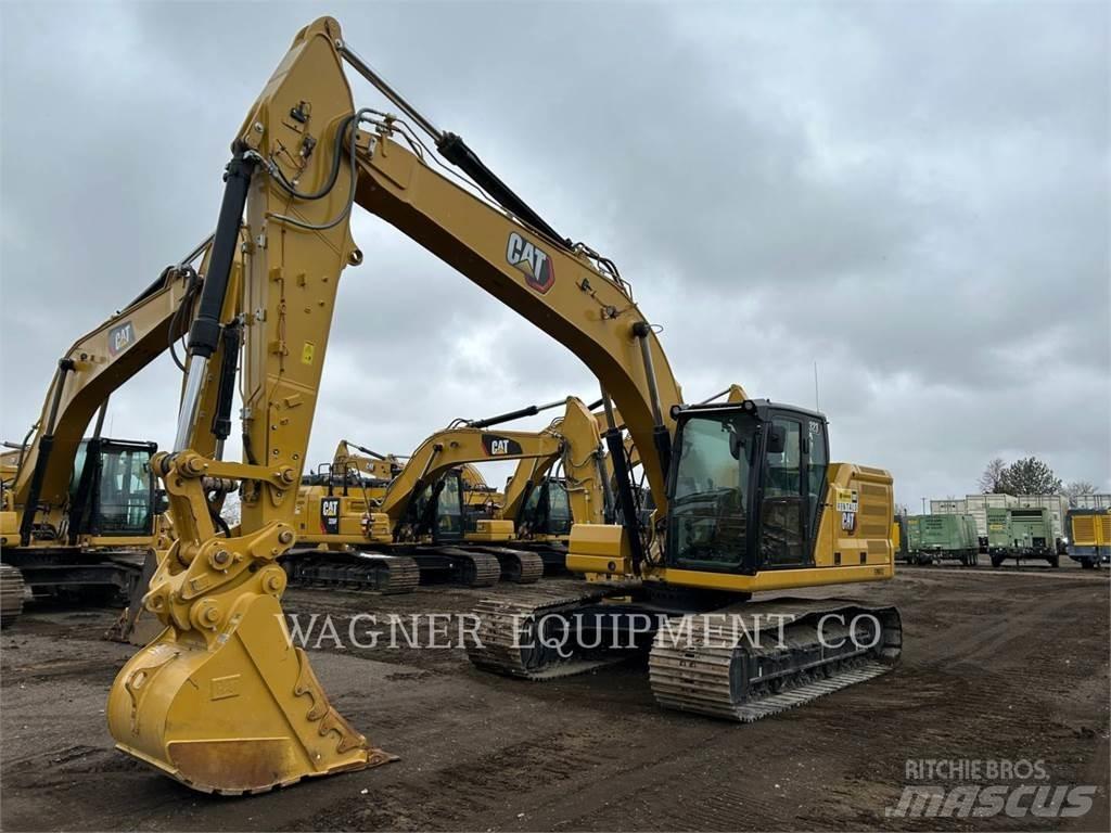 CAT 323 Telakaivukoneet