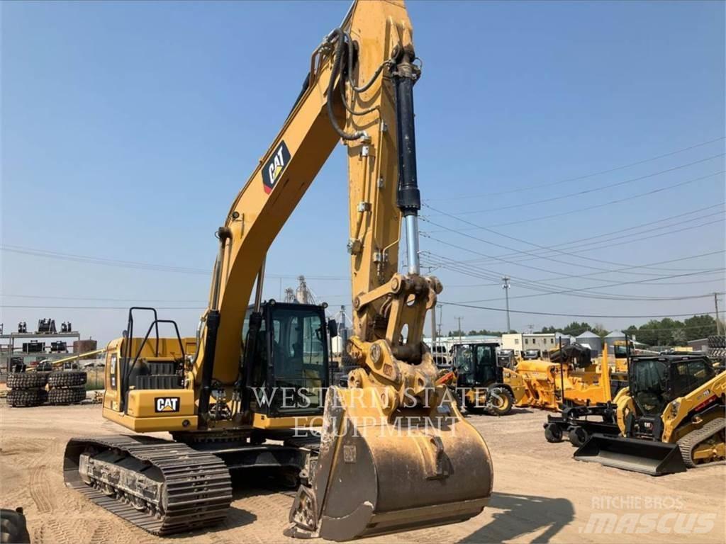 CAT 323 Telakaivukoneet