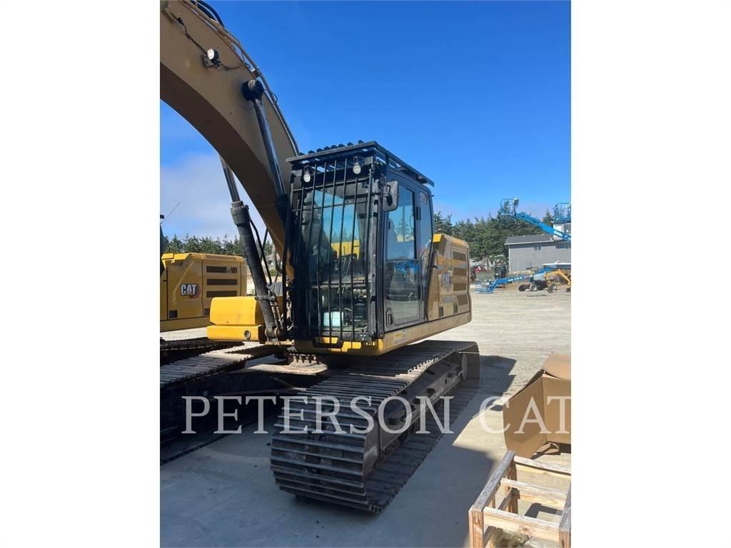 CAT 323 Telakaivukoneet