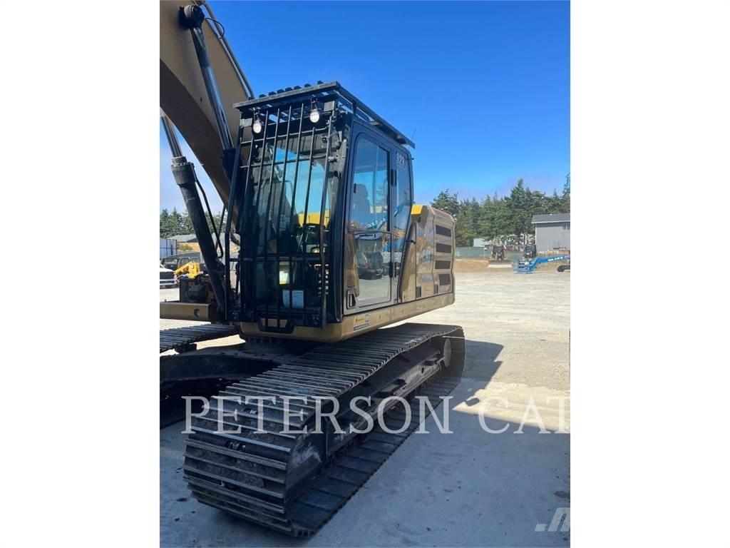 CAT 323 Telakaivukoneet