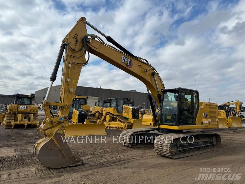 CAT 323 Telakaivukoneet