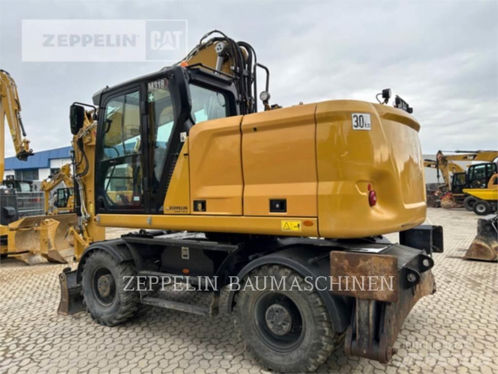 CAT M318-07A Pyöräkaivukoneet