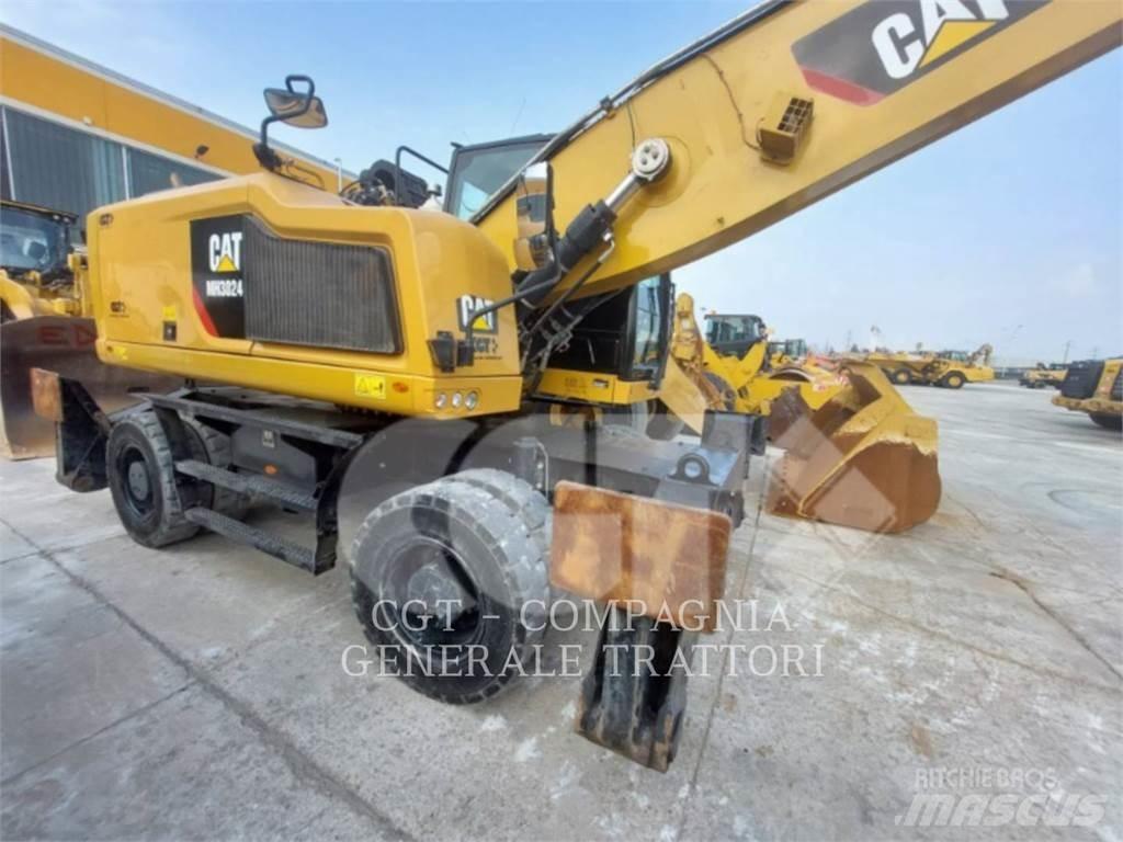 CAT MH3024 Pyöräkaivukoneet