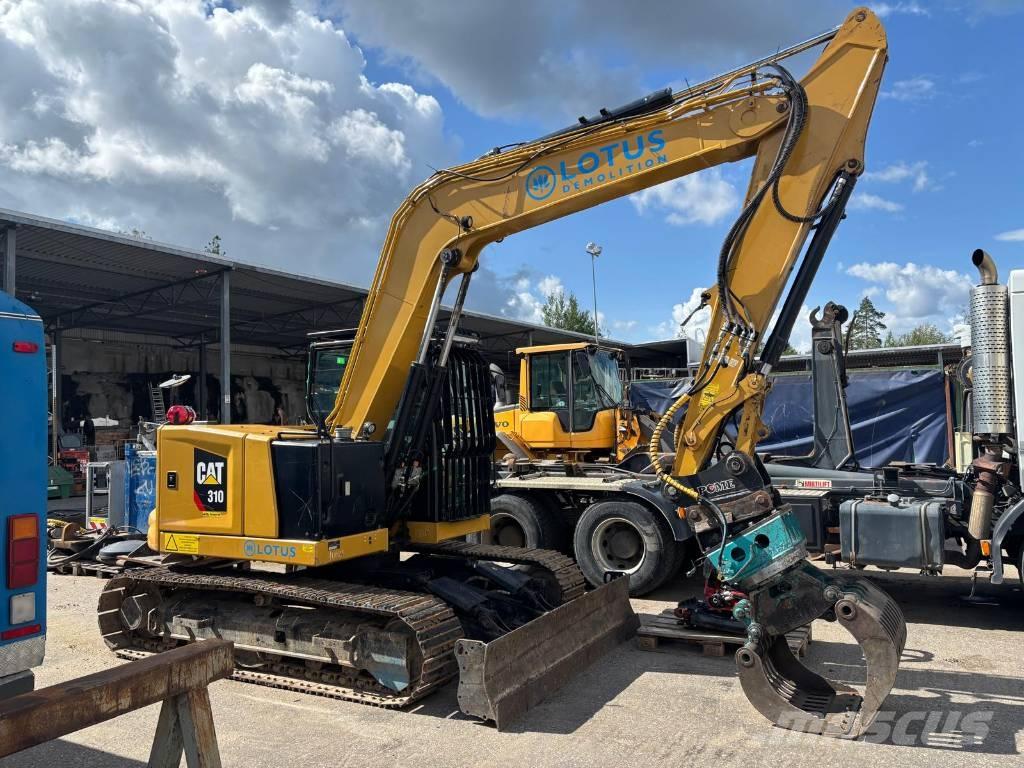 CAT 310 Telakaivukoneet