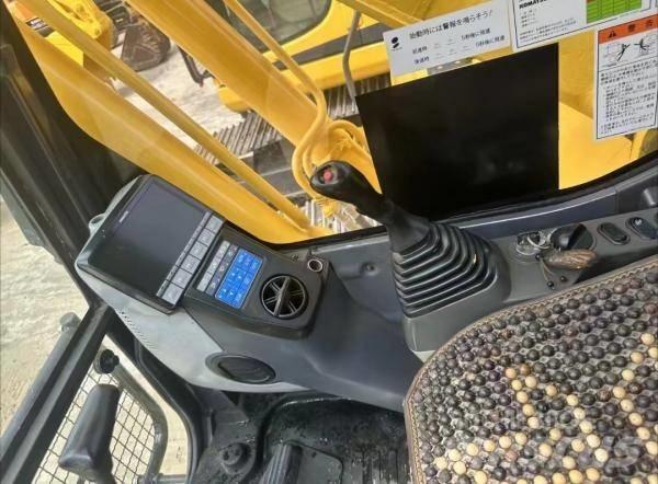 Komatsu PC 200 Midikaivukoneet 7t - 12t