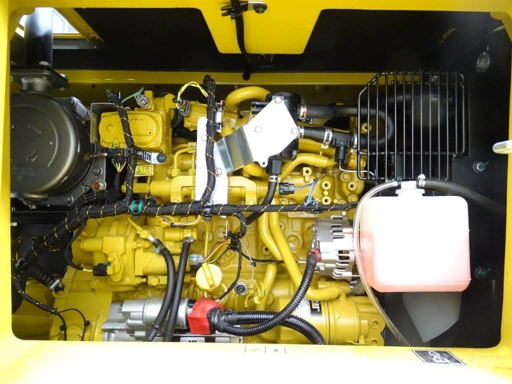 CAT 310 Telakaivukoneet